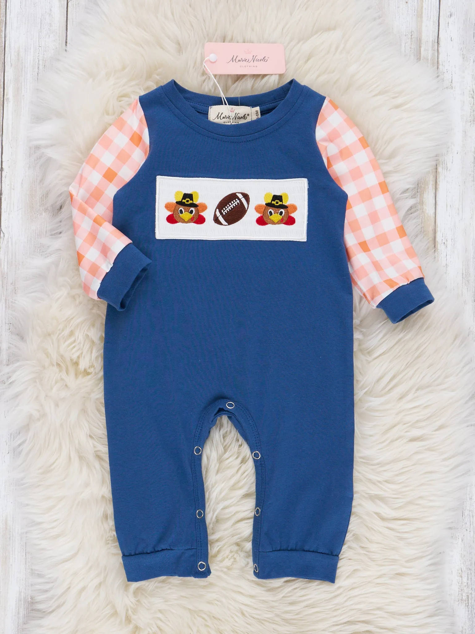 Navy & Orange Plaid Smocked Football Romper